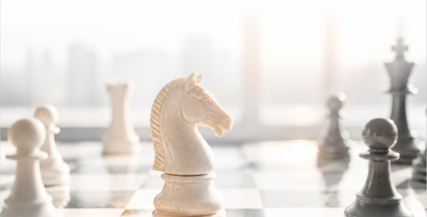 A white knight chess piece in focus among pawns on a chessboard